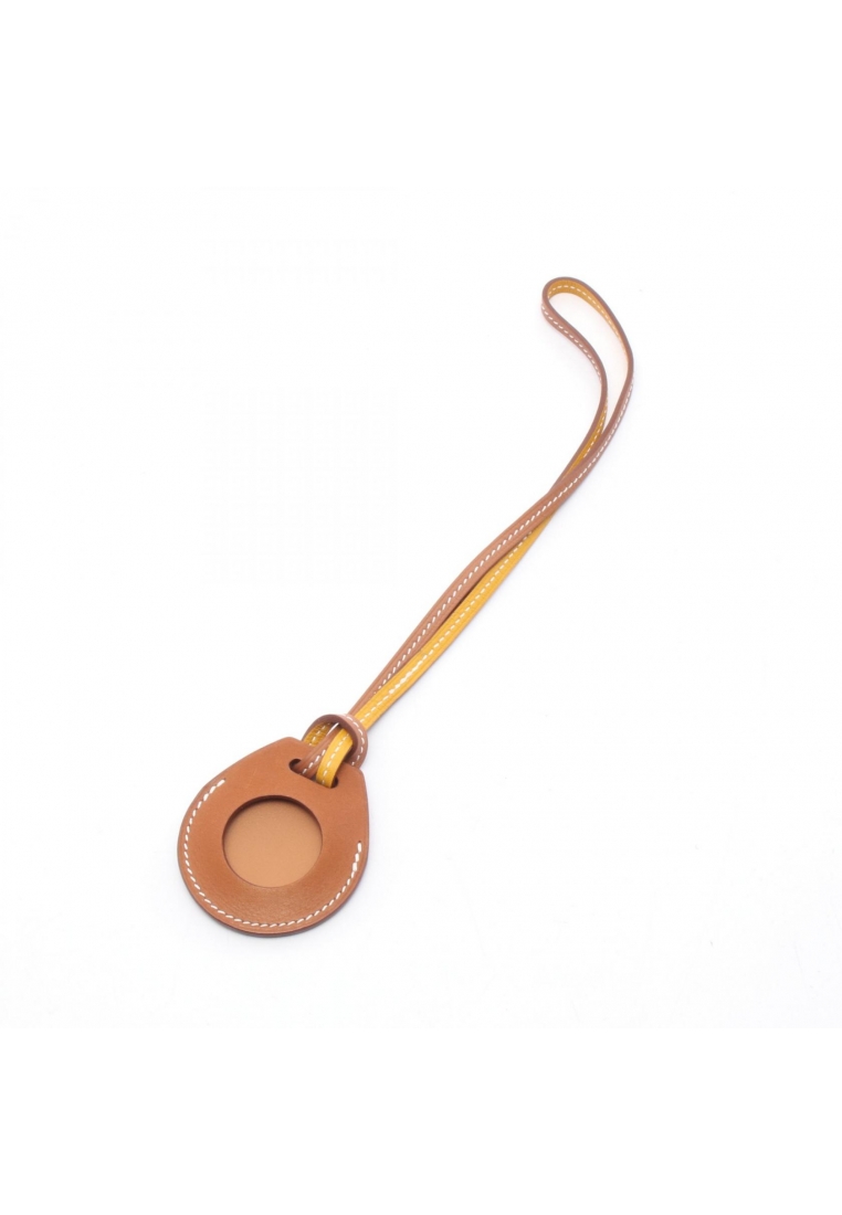 Hermès Pre-Loved Hermès Apple AirTag Hermes air tag gold jaune doll bag charm Veau Swift light brown